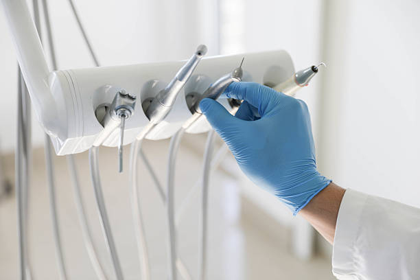 Professional Root Canal Treatment technician working in Laurel Hollow, NY